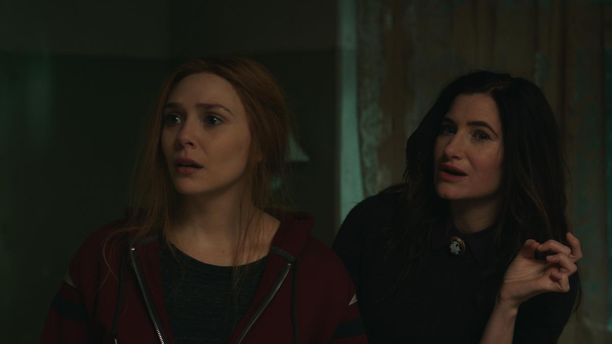 (L-R): Elizabeth Olsen as Wanda Maximoff and Kathryn Hahn as Agatha Harkness in “WandaVision.” Cr: Marvel Studios