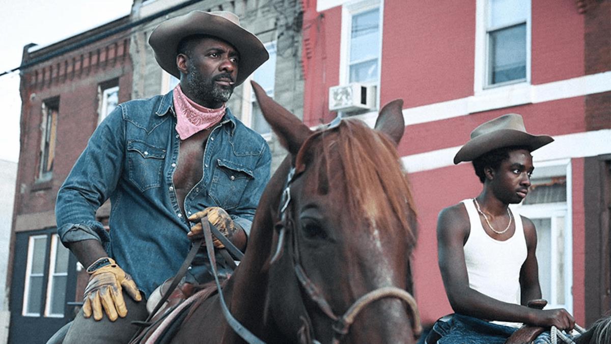 Idris Elba and Caleb McLaughlin in “Concrete Cowboy.” Cr: Netflix