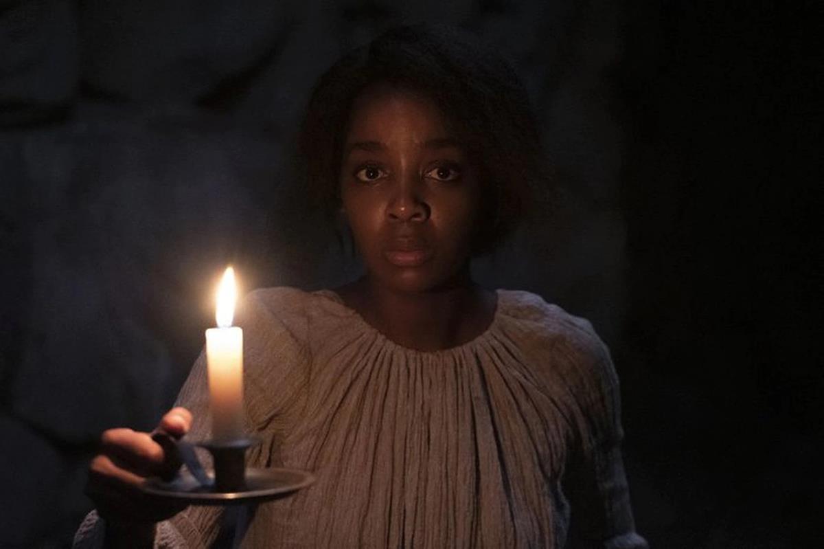 Thuso Mbedu as Cora in “The Underground Railroad.” Cr: Kyle Kaplan/Amazon Studios