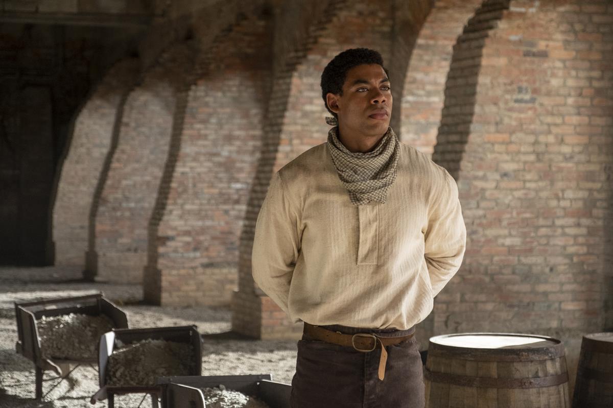 Aaron Pierre as Caesar in “The Underground Railroad.” Cr: Kyle Kaplan/Amazon Studios