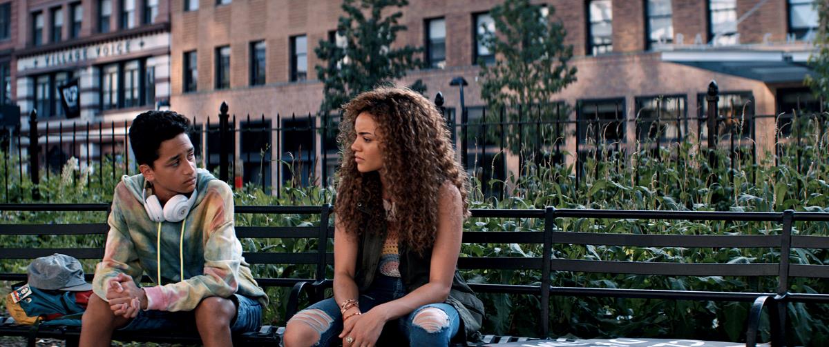 Gregory Diaz IV as Sonny and Leslie Grace as Nina Rosario in director Jon M. Chu’s screen adaptation of “In The Heights.” Cr: Macall Polay/Warner Bros.