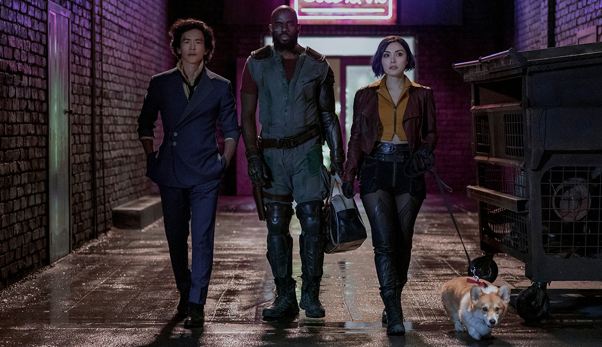  “Cowboy Bebop:” John Cho as Spike Spiegel, Mustafa Shakir as Jet Black, Daniella Pineda as Faye Valentine and Ein in “Cowboy Bebop” Cr. Geoffrey Short/Netflix © 2021