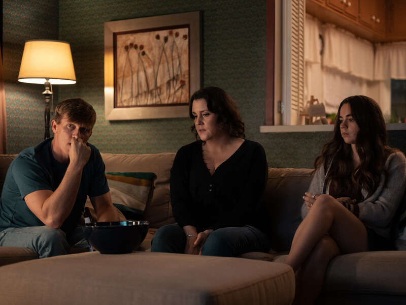 Warren Kole as Jeff Sadecki, Melanie Lynskey as Shauna, and Sarah Desjardins as Callie in season 1 episode 10 of “Yellowjackets.” Cr: Showtime