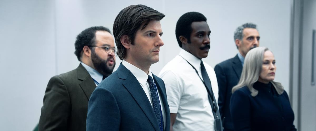 Adam Scott as Mark, Patricia Arquette as Harmony Cobel, John Turturro as Irving, Tramell Tillman as Milchick, and Zach Cherry as Dylan in season 1 episode 4 of “Severance.” Cr: Apple TV+