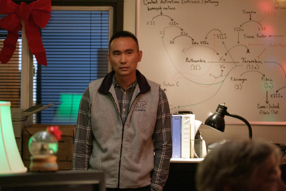 James Hiroyuki Liao as Edmond Ku in episode 1 of “The Dropout.” Cr: Beth Dubber/Hulu