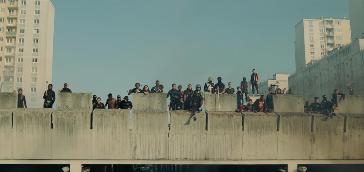 Sami Slimane as Karim in director Romain Gavras’s “Athena.” Cr: Netflix