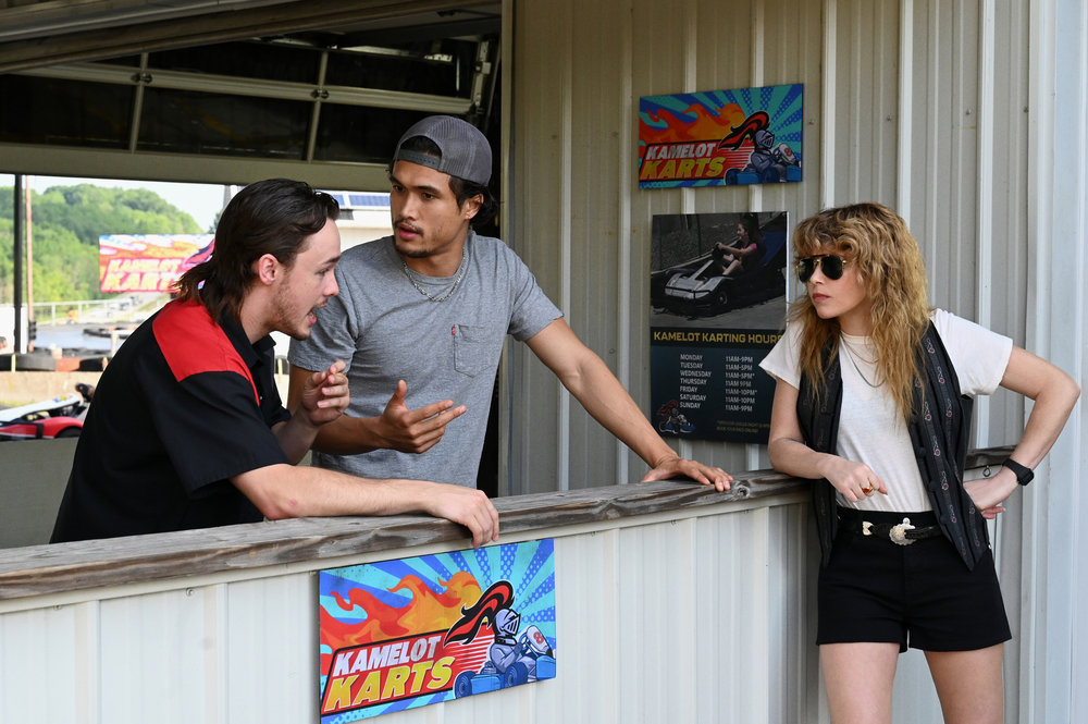 Jack Alcott as Randy, Charles Melton as Davis, and Natasha Lyonne as Charlie Cale in “Poker Face.” Cr: Phillip Caruso/Peacock