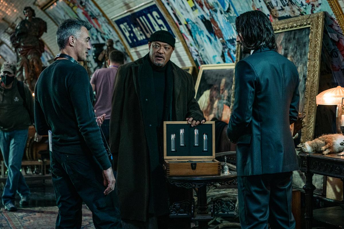 Director Chad Stahelski with Laurence Fishburne and Keanu Reeves on the set of “John Wick: Chapter 4.” Cr: Murray Close/Lionsgate